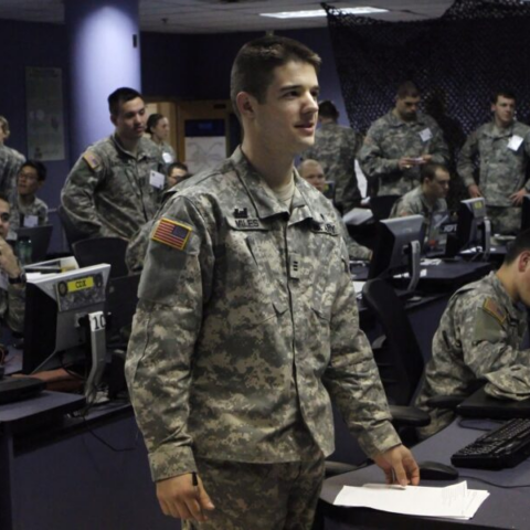 soldier stands in command room