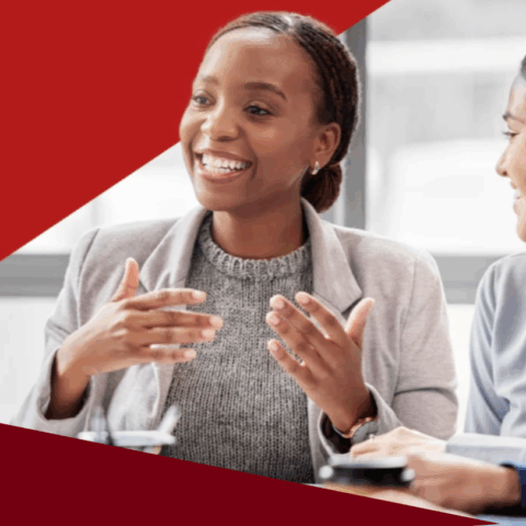 Woman speaking at a table during a meeting