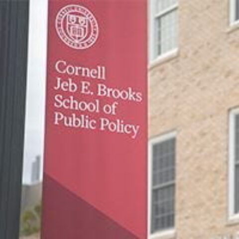 Brooks red banner with Cornell logo