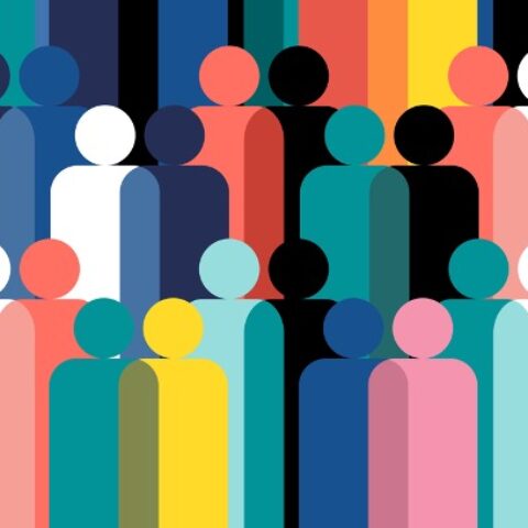 An audience of stick figure people in different colors.