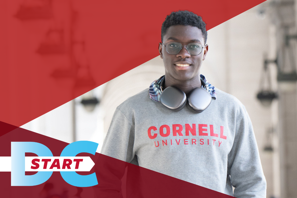 Student wearing Cornell sweatshirt with red triangle graphic overlay and DC Start in blue text