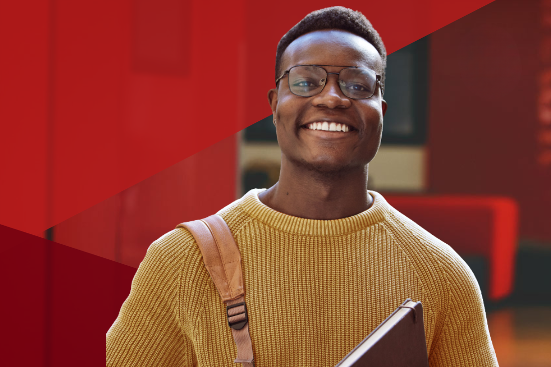 ESPP student wearing yellow sweater smiling at camera with red triangle overlays