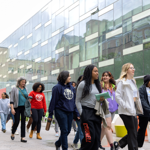 Group of NextGenPop students walking on Cornell campus