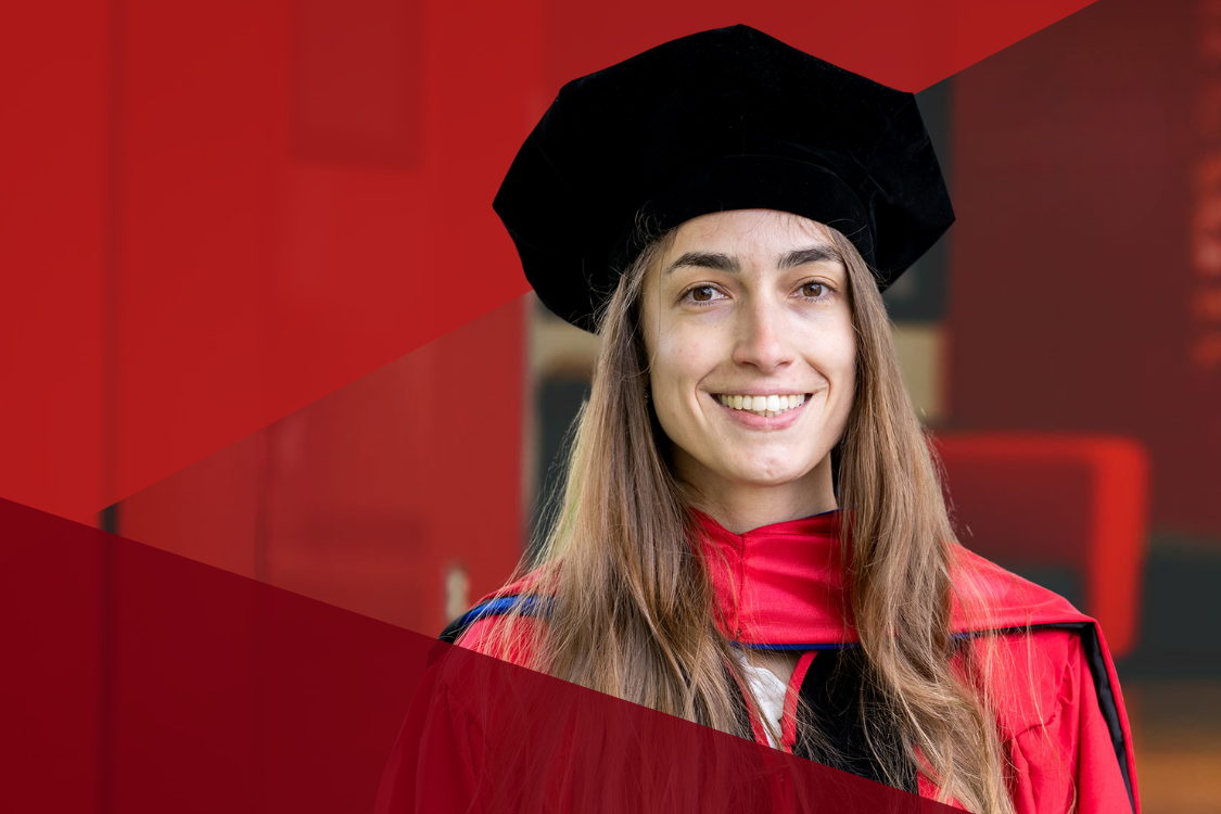 Brooks PhD student in graduation cap with red triangle overlay