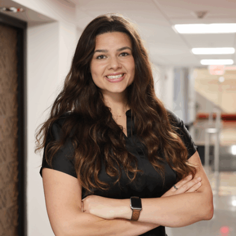 Samantha standing in Brooks School hallway