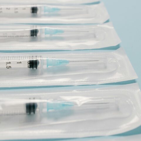 Row of packaged syringes