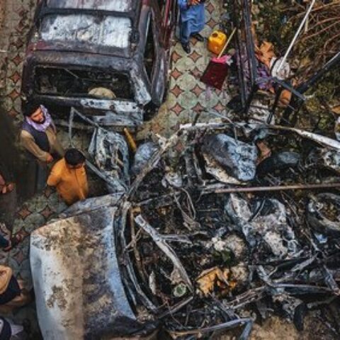 view of cars from above in street after explosion